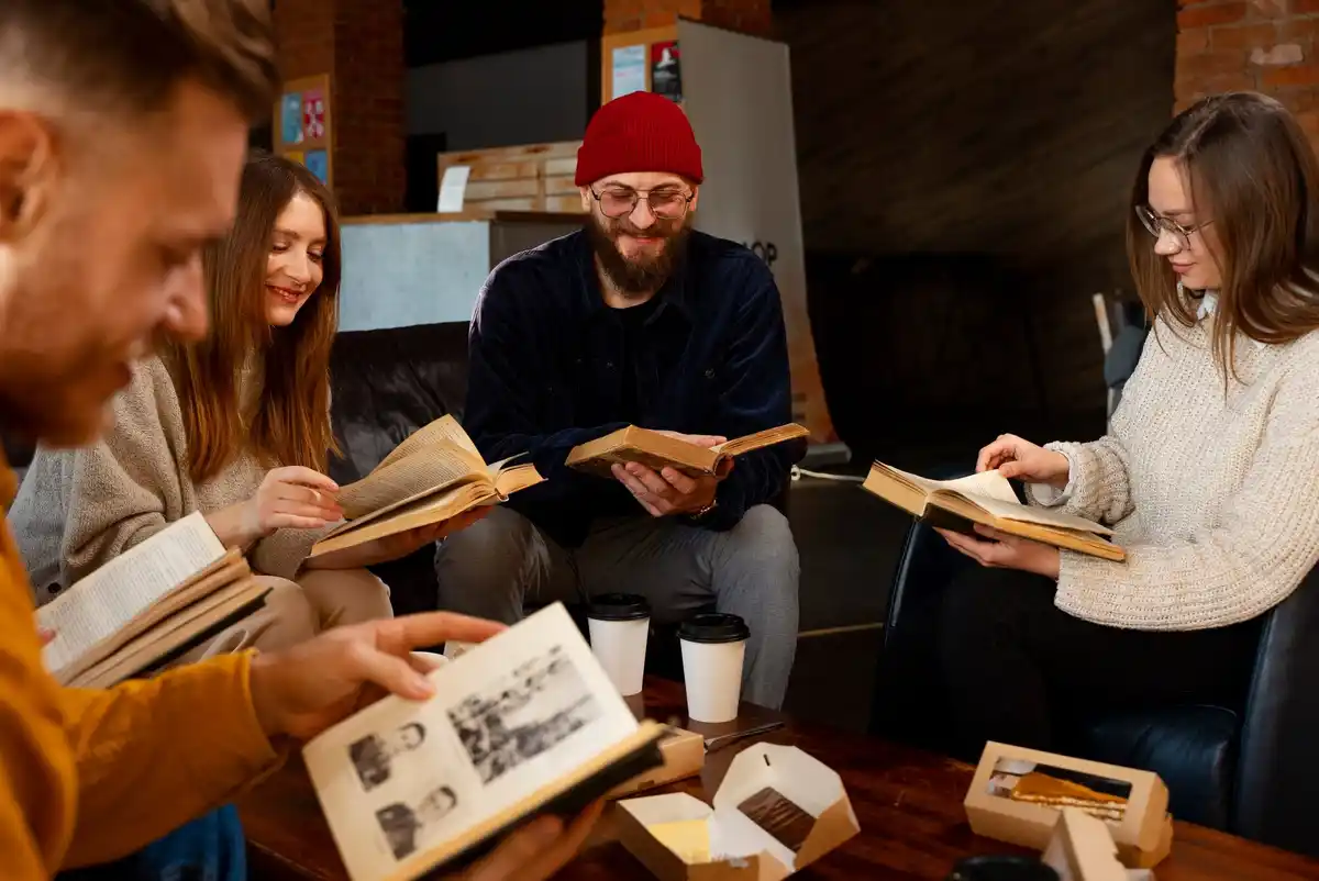 czech family looking at old photo album living room