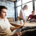 young czech people focused one task modern office prague