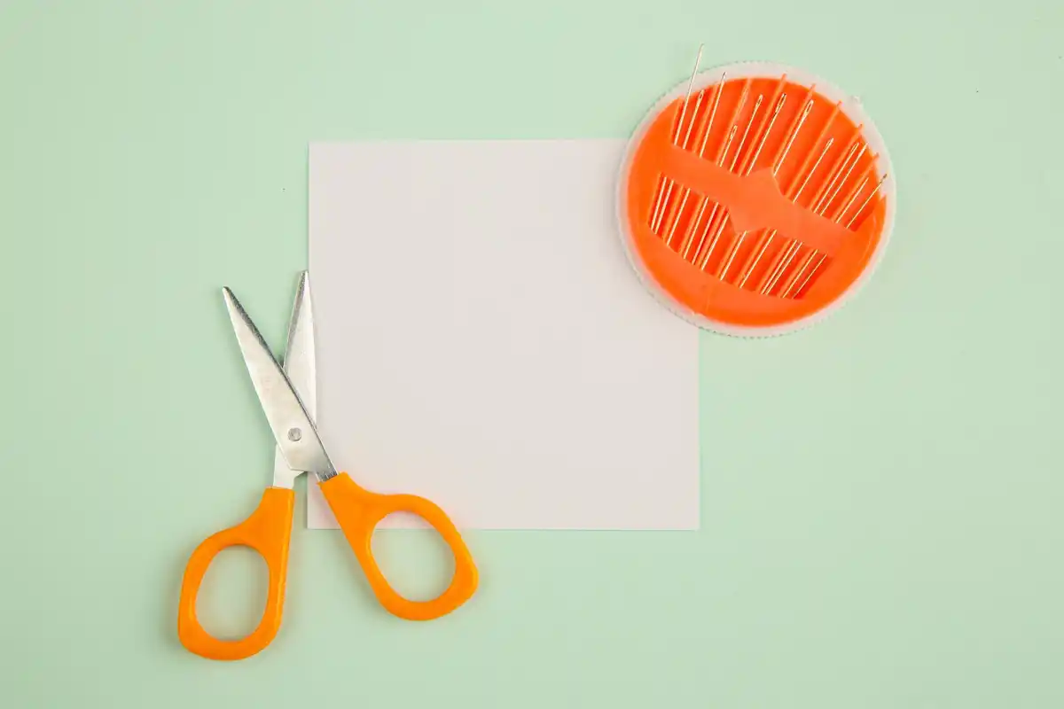 expired credit card on desk with scissors