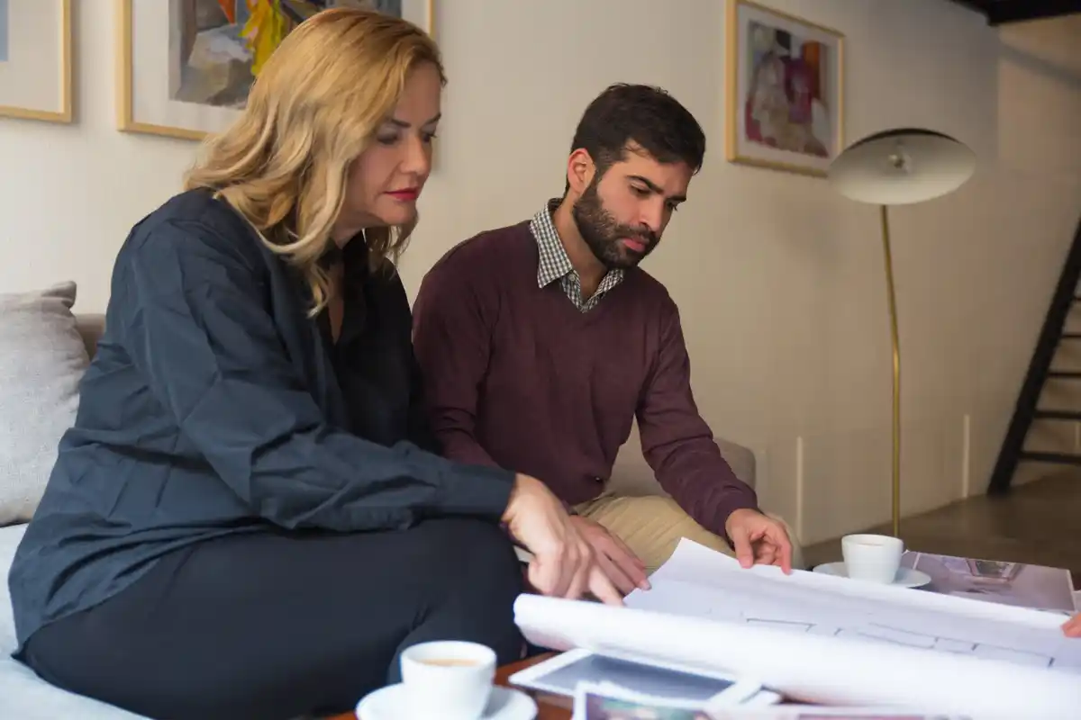 middle aged czech couple managing family budget at home