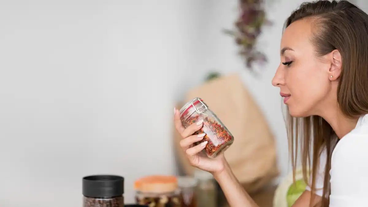 Czech woman looking worried at protein powder label