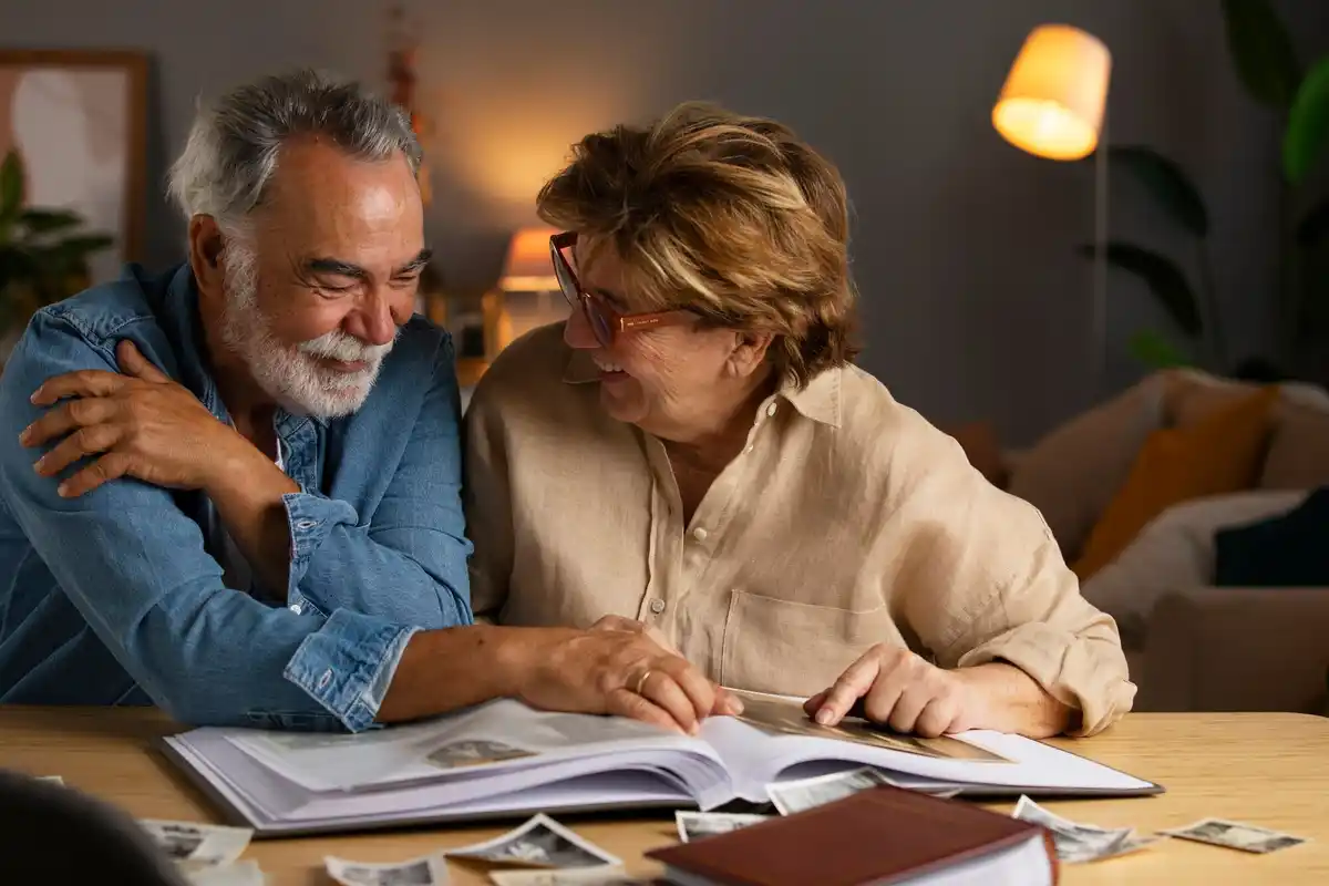 middle-aged couple counting savings at home czech