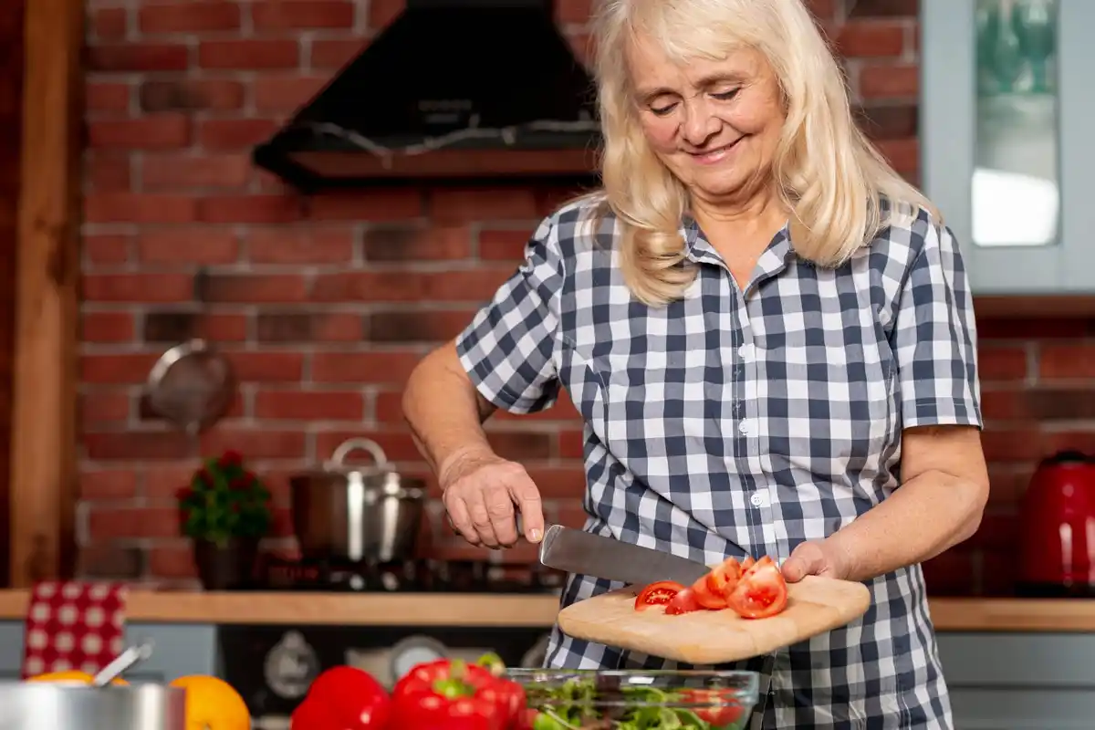grandma adding sugar to tomato sauce kitchen czech authentic
