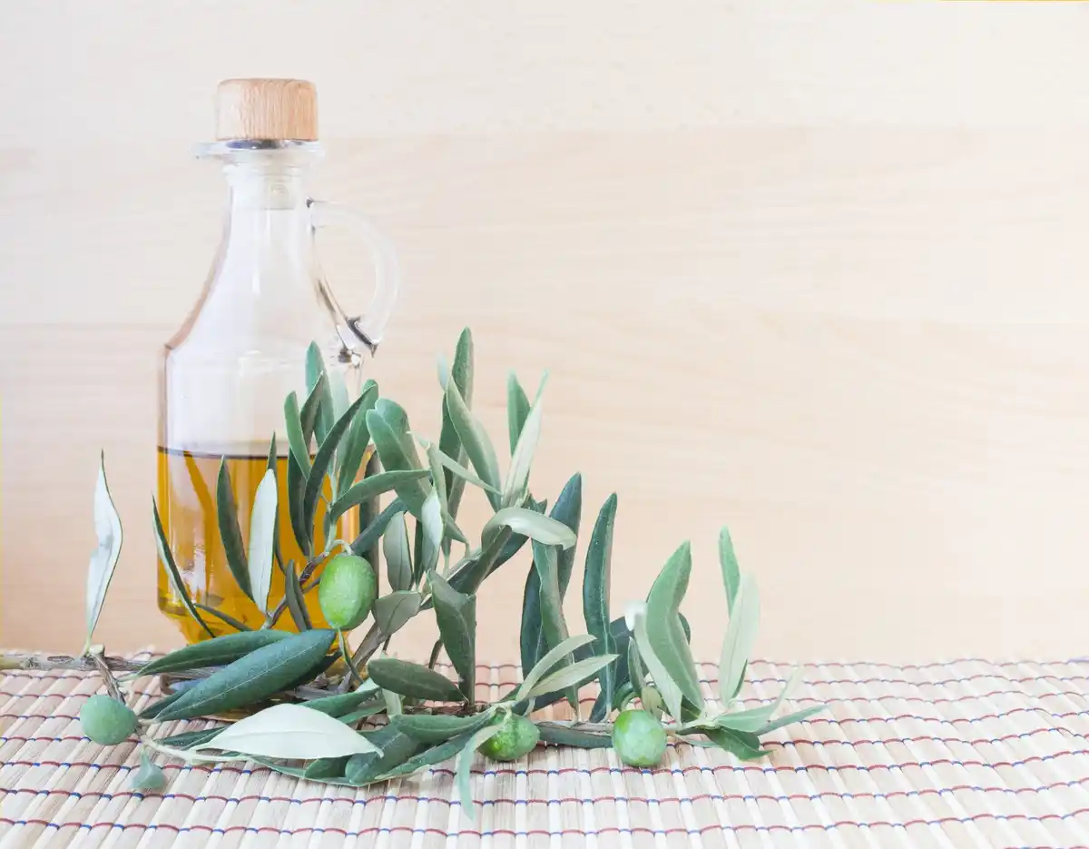 homemade herb olive oil wooden table sun czech style